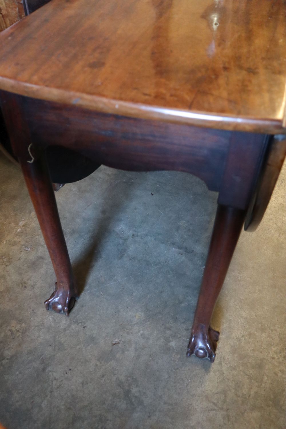 A George III mahogany drop-leaf dining table, width 122cm